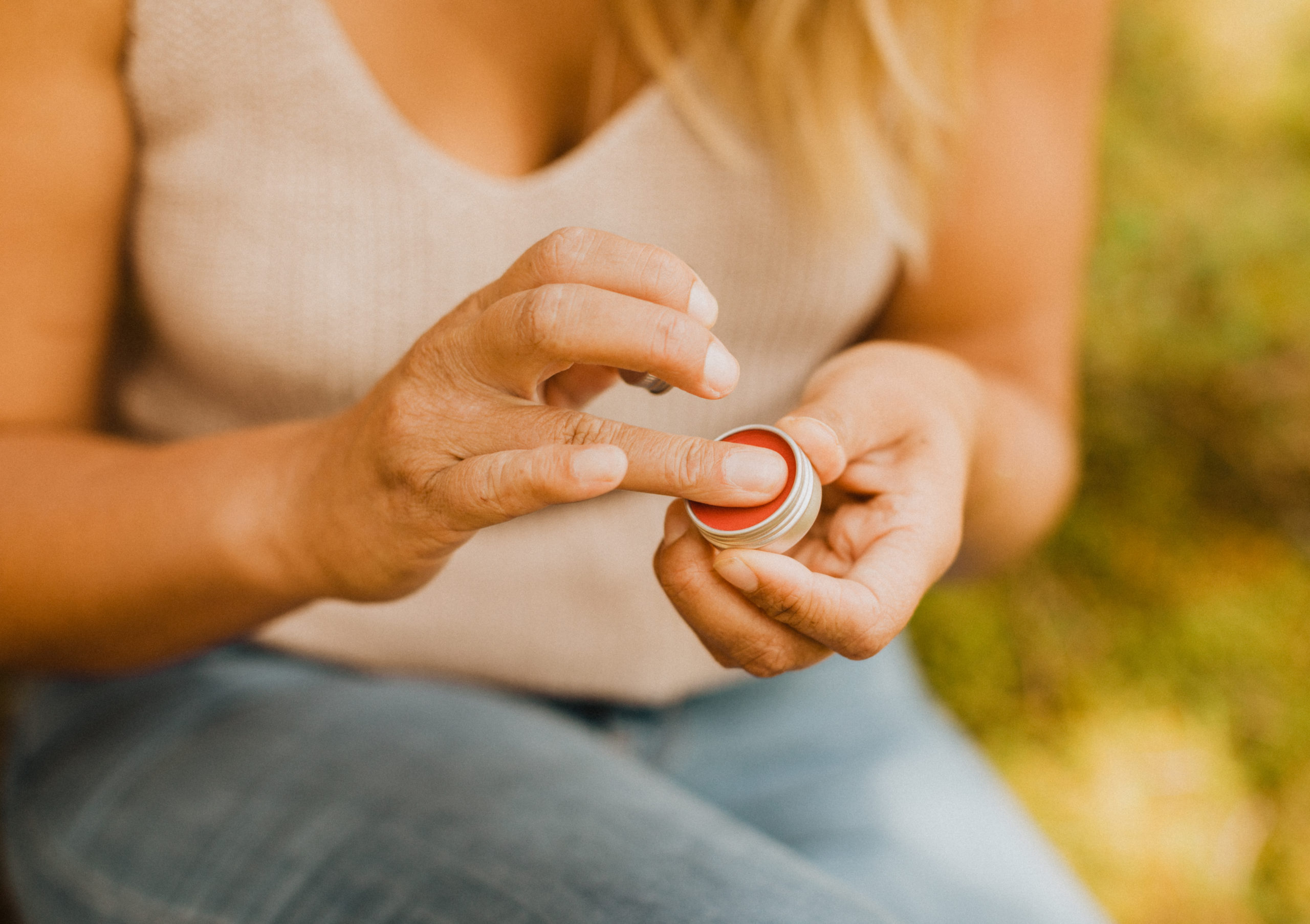 Woman Applying Natural Lip Balm